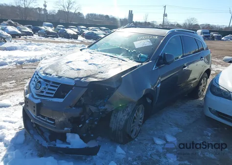 2014 Cadillac Srx Luxury Collection z USA, uszkodzony, nr VIN 3GYFNBE30ES573825